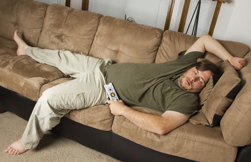 man-sleeping-on-sofa
